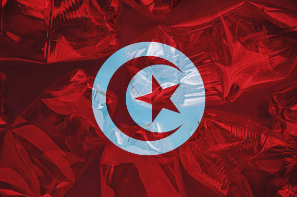 istock Tunisia flag is shown on the plastic bottles. Ecology concept with environmental pollution from household and industrial waste. Concept of stopping plastic pollution. Ban disposable products. 1502622986