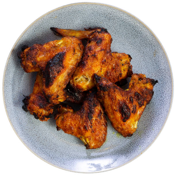 istock Grilled chicken wings served in the plate 1502629259