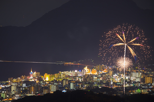 it is Night view and fireworks in Beppu city, Oita prefecture, Japan