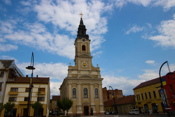 The edifice known as the Moon Church ( Biserica cu luna ) is one of the emblematic monuments of the city. The foundation stone of the church was laid down in 1784 by Petru Petrovici, Bishop of Arad