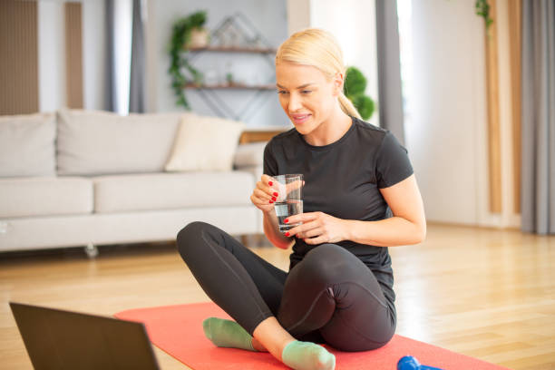 istock Young woman at home keeping fit by exercising 1502672949