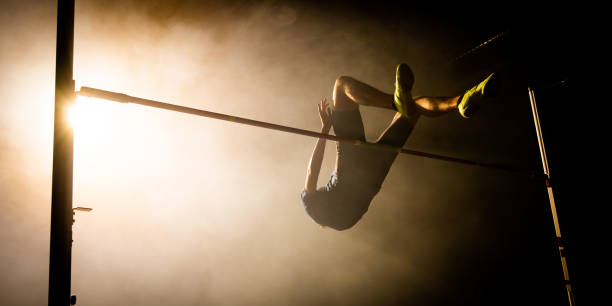 istock Sportsman dark silhouette training high jump 1502674591