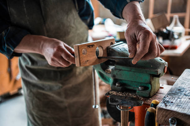 istock Carpenter working in his workshop.Small business owner. 1502677391