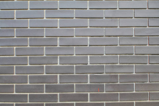istock Black and grey brick wall texture interior or exterior design backdrop, vintage dark tone. Blank copy space. 1502681869