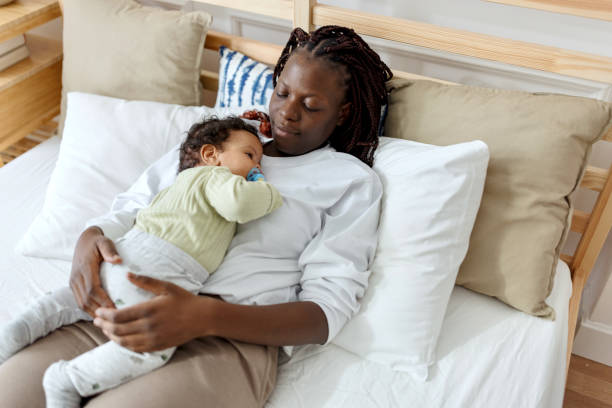 istock Cute baby enjoying with his mom 1502684108
