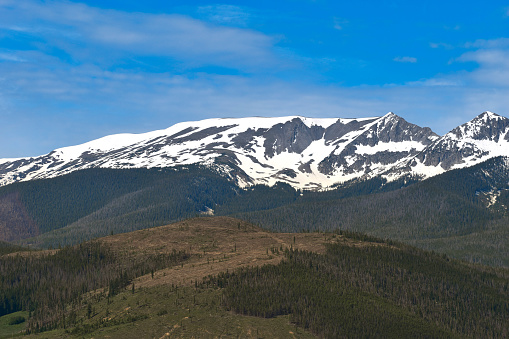 The snow capped Peak 4 in the majestic Tenmile Range as seen from Swan Mountain Road in Breckenridge, Colorado.