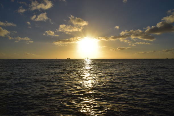 istock Beautiful sunsets and ocean from the beach in Hawaii 1502698570