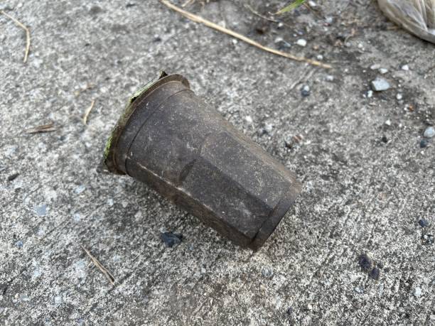 istock dirty plastic cup on the ground 1502698602