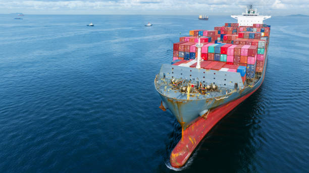 istock Cargo container Ship, cargo maritime ship with contrail in the ocean ship carrying container and running for export concept technology freight shipping sea freight by Express Ship. front view 1502702703