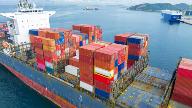 istock Aerial stern view Cargo Ship carrying container and running for export goods from cargo yard port to other ocean concept freight shipping ship . 1502702807