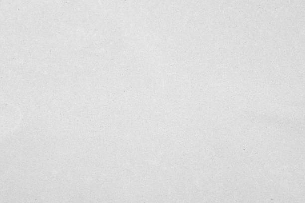 istock White color eco recycled kraft paper sheet texture cardboard background. 1502706117