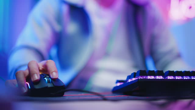 Esport gamer using RGB control keyboard