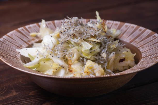 istock Boiled cabbage and whitebait salad. 1502727386
