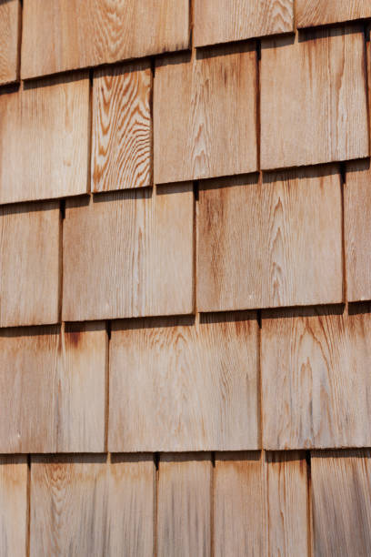 istock Wooden cedar wall siding shingle background 1502729739