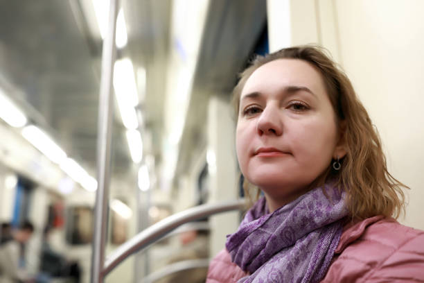istock Woman in subway train 1502762633