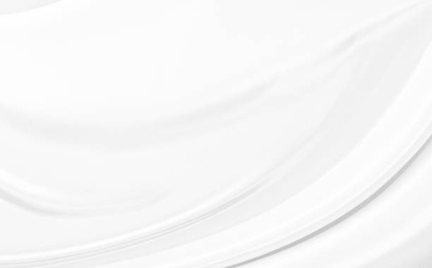 istock White gray satin texture that is white silver fabric silk background with beautiful soft blur pattern natural. 1502769256