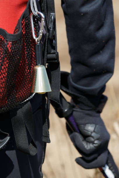 istock Brass bear bell hanging from rucksack 1502770007