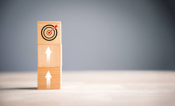 istock Wooden blocks with Target icon on top 1502770383