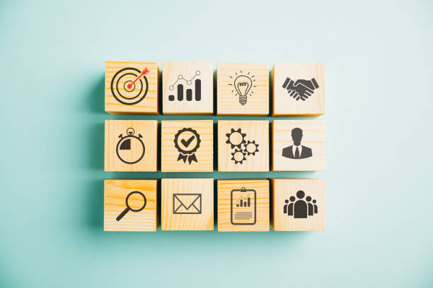 istock Wooden block cude step on table with Action Plan 1502770409