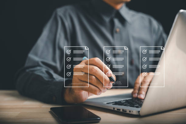 istock Efficient document management Businessman uses pen to sign electronic documents on virtual screen 1502770460
