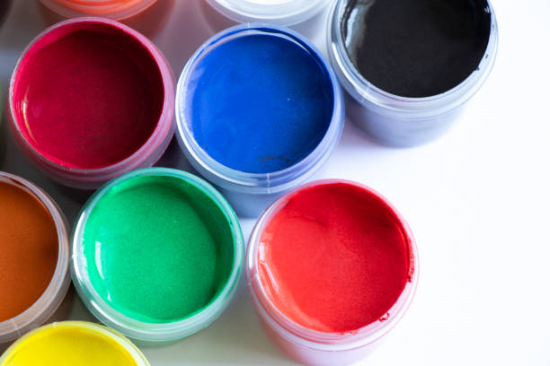 istock watercolor paints stand on a table in daylight 1502772344