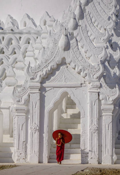 istock A Buddhist novice monk at white temple 1502775031