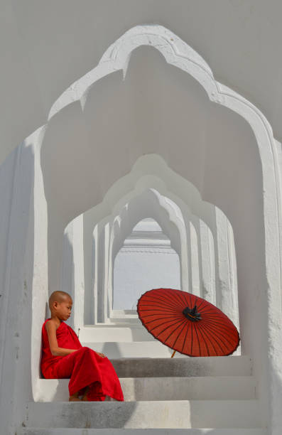 istock A Buddhist novice monk at white temple 1502775137