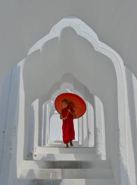 istock A Buddhist novice monk at white temple 1502775272