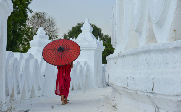 istock A Buddhist novice monk at white temple 1502775548
