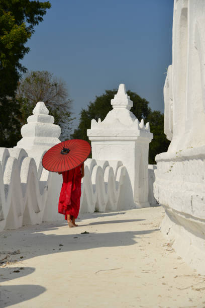 istock A Buddhist novice monk at white temple 1502775649