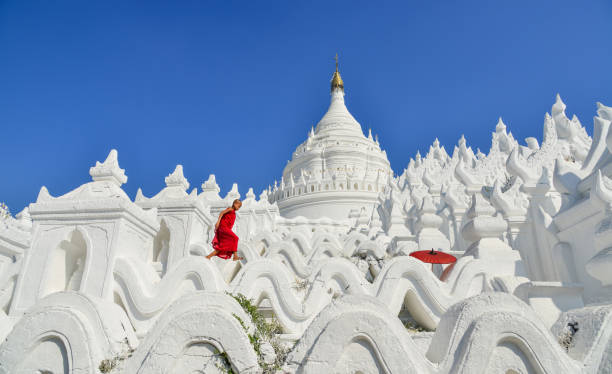 istock A Buddhist novice monk at white temple 1502776742