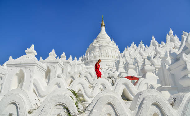 istock A Buddhist novice monk at white temple 1502776746