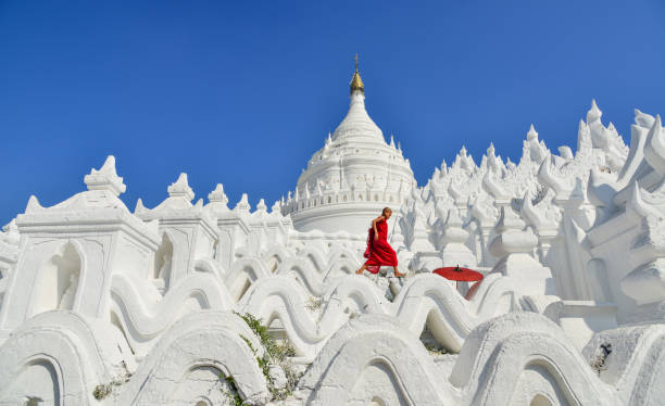 istock A Buddhist novice monk at white temple 1502776756