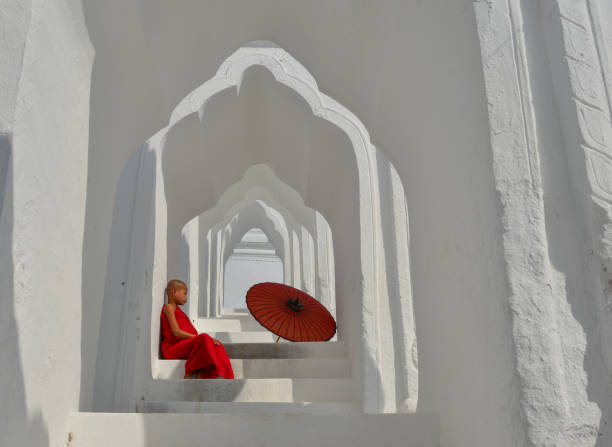 istock A Buddhist novice monk at white temple 1502779750