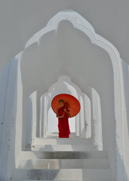 istock A Buddhist novice monk at white temple 1502779781