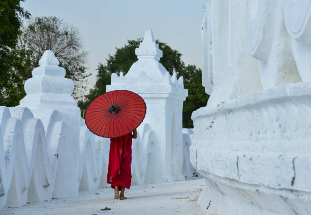 istock A Buddhist novice monk at white temple 1502779787