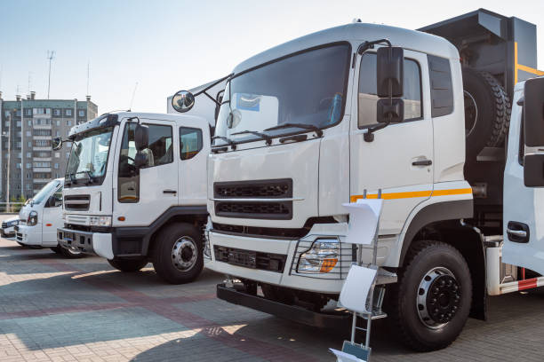 istock White modern trucks at an industrial exhibition 1502779808