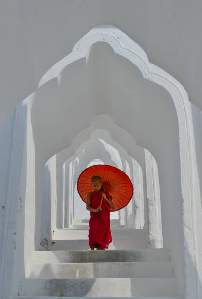 istock A Buddhist novice monk at white temple 1502779810