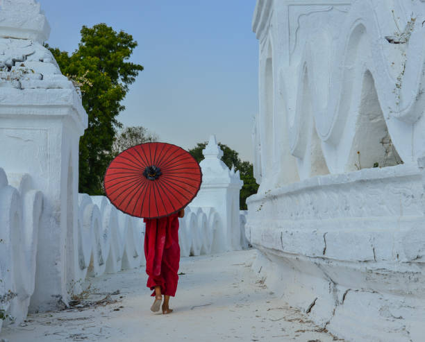istock A Buddhist novice monk at white temple 1502779812