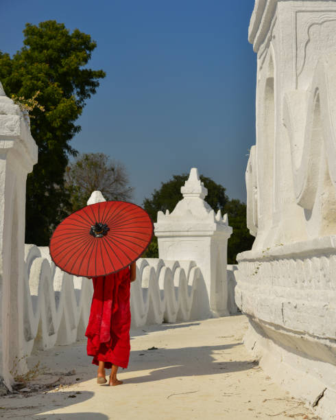 istock A Buddhist novice monk at white temple 1502779825