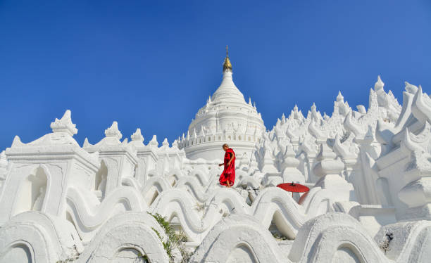 istock A Buddhist novice monk at white temple 1502779880