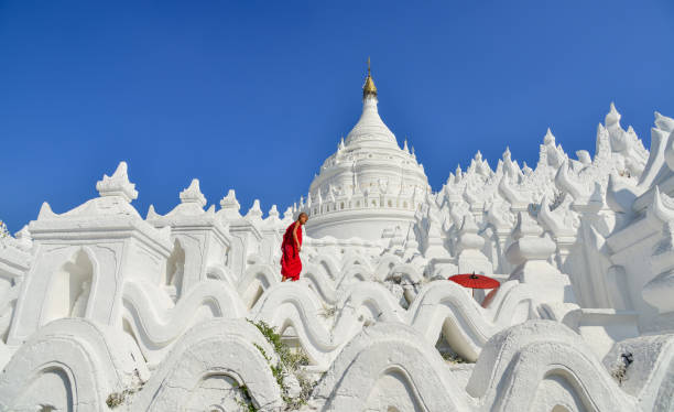 istock A Buddhist novice monk at white temple 1502779938