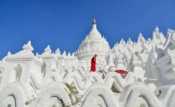 istock A Buddhist novice monk at white temple 1502779940