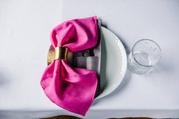 istock Plate, dishes, glasses, forks, pink napkins. Decor rustic style. Luxury table setting dinner in restaurant. Event, served banquet ready for guests in hall. Birthday party, wedding reception. Top view 1502780478
