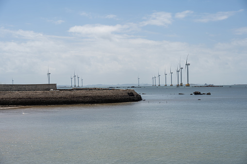 Offshore wind power generation and docks