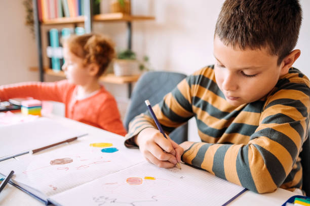 istock Kids playing school at home 1502790806