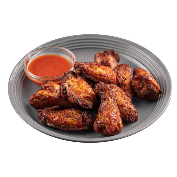istock Isolated portion of baked chicken wings 1502792225