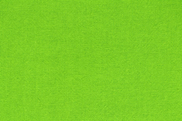 istock Light green cotton fabric cloth texture for background, natural textile pattern. 1502792243