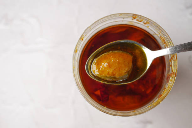 istock Homemade Mango Pickle in a glass jar on table , 1502794976
