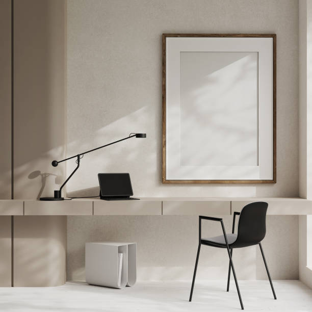 istock Close up view on bright office room interior with empty white mock up poster, desk. 1502800337